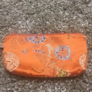 Orange wristlet